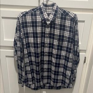 Burberry Navy and White Checkered Casual Shirt!
A little discoloration in neck!